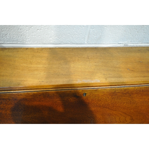 153 - A REPRODUCTION CHEST ON STAND, the fall front door enclosing a fitted interior, atop a base with fou... 