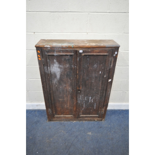 156 - A STAINED PINE DOUBLE DOOR CABINET, width 93cm x depth 28cm x height 123cm, historical woodworm, mar... 