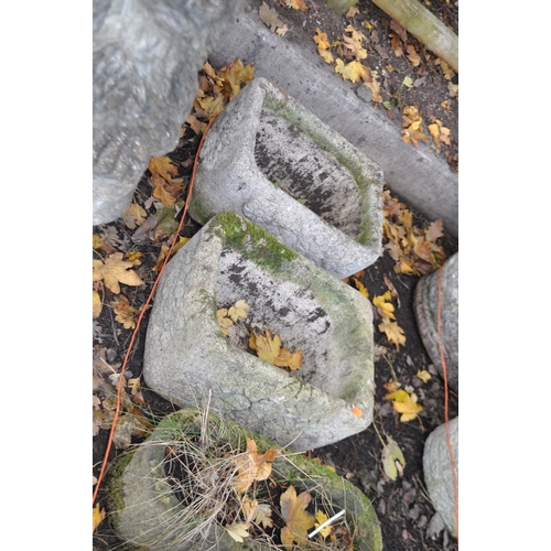 16 - A SANDSTONE TRIANGULAR TROUGH, 48cm x depth 31cm x height 18cm, two pairs of small concrete planters... 