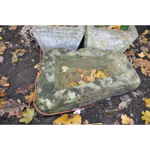 16 - A SANDSTONE TRIANGULAR TROUGH, 48cm x depth 31cm x height 18cm, two pairs of small concrete planters... 
