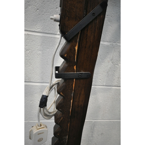 163 - A PAIR OF ARTS AND CRAFTS STYLE OAK STANDARD LAMP, with adjustable height clasp and a four sided gla... 