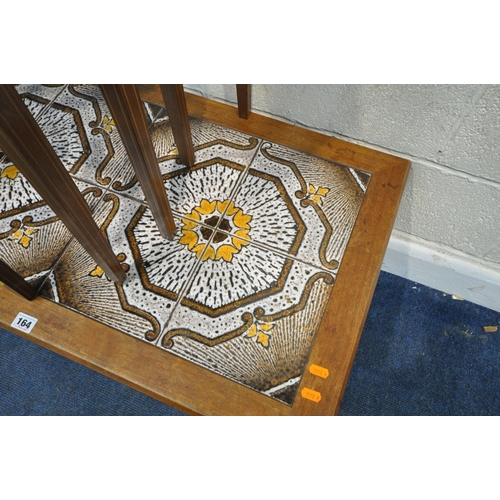 164 - A RECTANGULAR TILE TOP COFFEE TABLE, width 93cm x depth 52cm x height 42cm, a nest of four tables, a... 