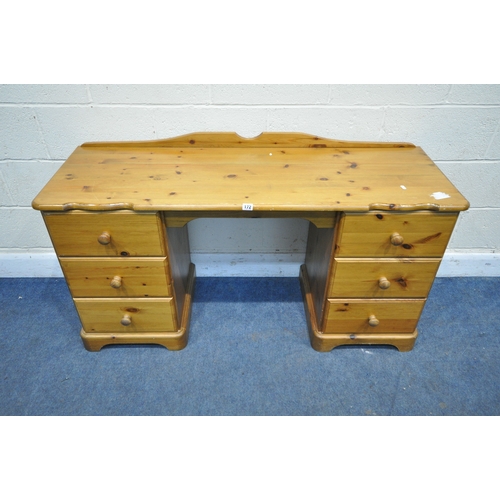 172 - A MODERN PINE DRESSING TABLE, fitted with two banks of three drawers, width 138cm x depth 50cm x hei... 