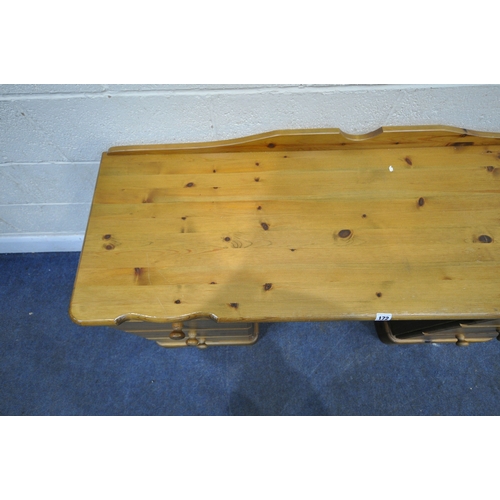 172 - A MODERN PINE DRESSING TABLE, fitted with two banks of three drawers, width 138cm x depth 50cm x hei... 