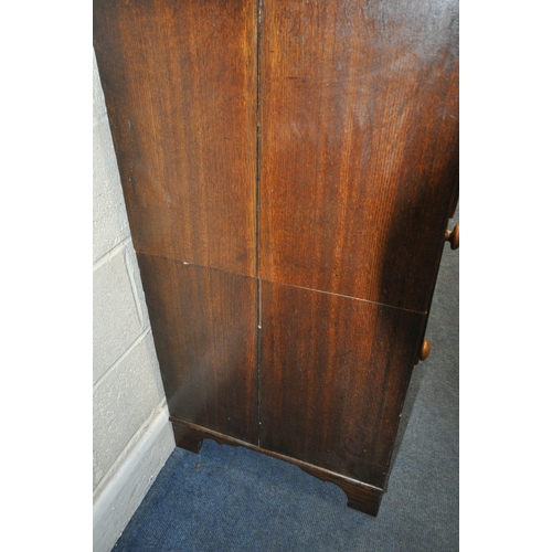 175 - A 19TH CENTURY OAK CHEST OF THREE LONG GRADUATED DRAWERS, raised on bracket feet, width 123cm x dept... 
