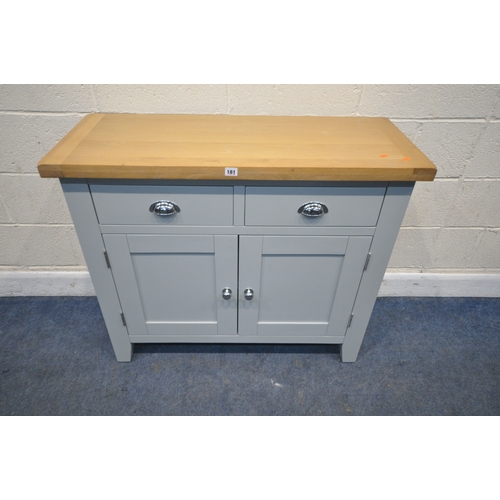 181 - A MODERN PARTIALLY PAINTED LIGHT OAK SIDE TABLE, with two drawers over double cupboard doors, width ... 