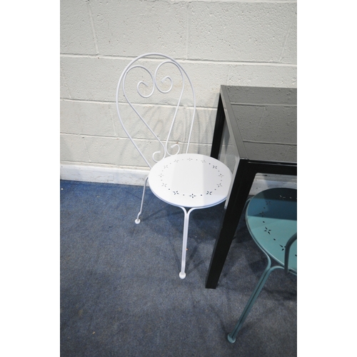 185 - A MODERN SMOKED GLASS RECTANGULAR TABLE, raised on a metal frame, width 120cm x depth 70cm x height ... 