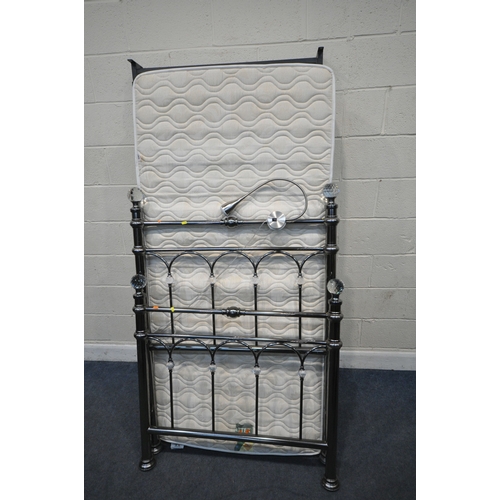 190 - A SINGLE MATTRESS, with a tubular metal bedstead, condition report: label ripped off the mattress, o... 