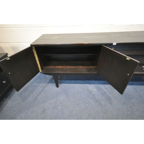 215 - A MID CENTURY SIDEBOARD, fitted with three drawers, double cupboard doors, and a fall front door, ra... 