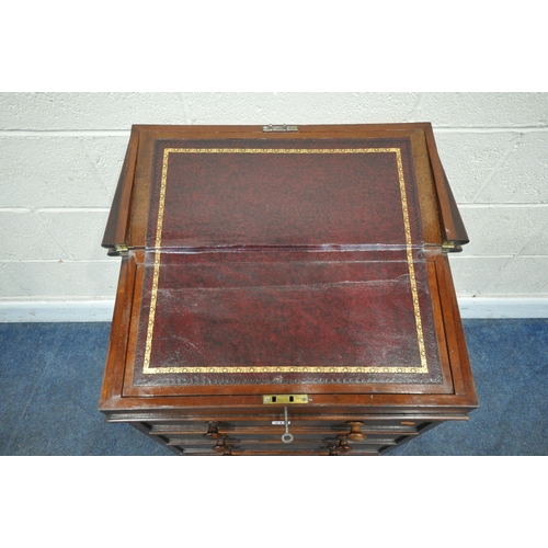 219 - AN EARLY 19TH CENTURY MAHOGANY DAVENPORT, the multidirectional spinning top can move in four directi... 