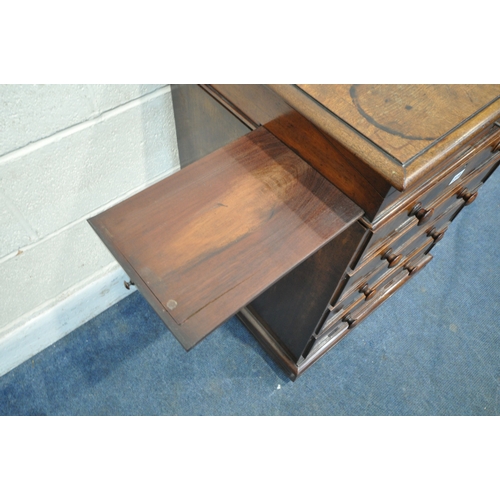 219 - AN EARLY 19TH CENTURY MAHOGANY DAVENPORT, the multidirectional spinning top can move in four directi... 