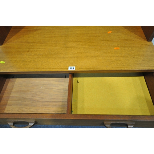 224 - G PLAN, A MID-CENTURY TEAK WALL CABINET, with double glass doors, atop a base with a single drawer, ... 