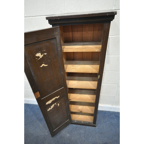 233 - A STAINED PINE CABINET, with a single cupboard door enclosing shelves, width 49cm x depth 33cm x hei... 