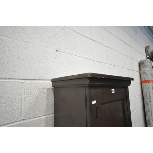 233 - A STAINED PINE CABINET, with a single cupboard door enclosing shelves, width 49cm x depth 33cm x hei... 