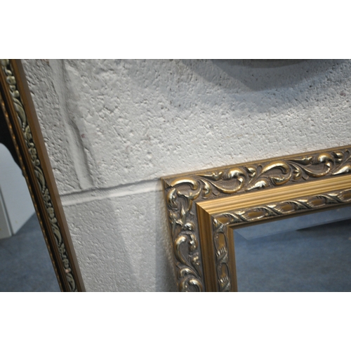 239 - A GILT WOOD RECTANGULAR BEVELLED EDGE WALL MIRROR, 66cm x 54cm, along with three other gilt wall mir... 