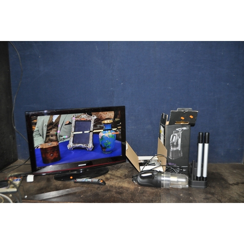 76 - A SAMSUNG LE32C450E1W 32in TV with remote and a Oneday handheld vacuum cleaner (both PAT pass and wo... 