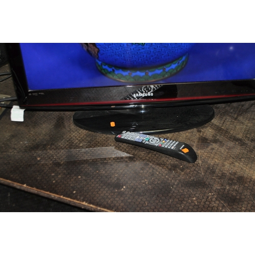 76 - A SAMSUNG LE32C450E1W 32in TV with remote and a Oneday handheld vacuum cleaner (both PAT pass and wo... 