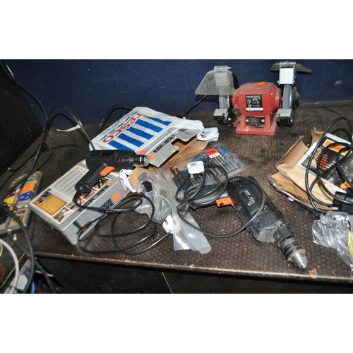 77 - A COLLECTION OF POWER TOOLS including a Parkside bench grinder, a Black and Decker, drill, Challenge... 