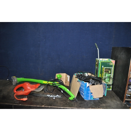 83 - A COLLECTION OF GARDEN ELECTRICAL ITEMS including a Black and Decker hedge trimmer, a 'The Handy' pa... 