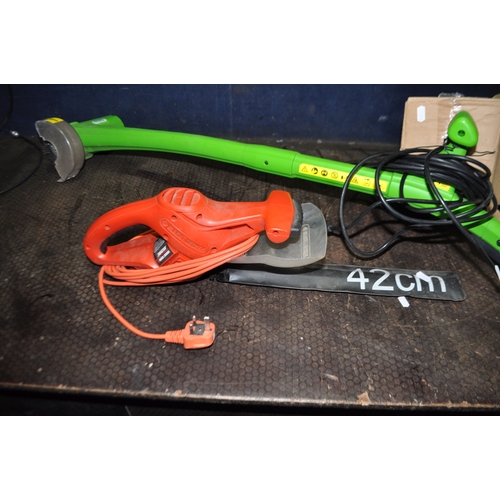 83 - A COLLECTION OF GARDEN ELECTRICAL ITEMS including a Black and Decker hedge trimmer, a 'The Handy' pa... 