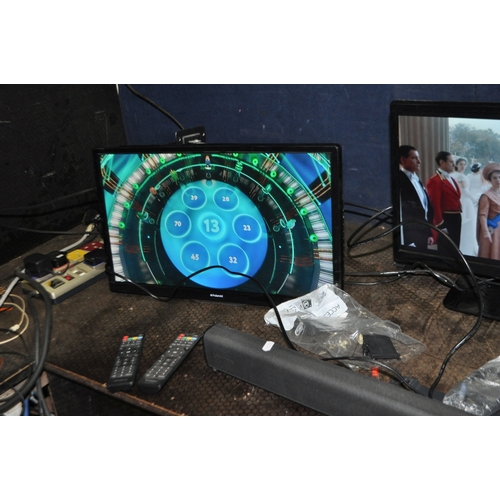 84 - TWO POLAROID 22in TV/DVD COMBI (one with stand and one with wall bracket, two Firesticks, a Cambridg... 