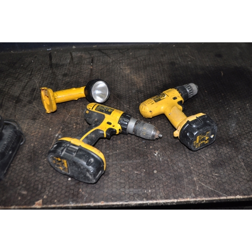 85 - A COLLECTION OF DeWALT POWER TOOLS including a DC725 drill with charger and two 18v batteries, a DW9... 
