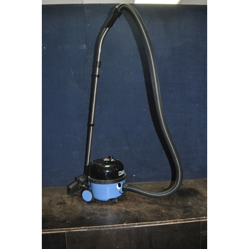 87 - A NUMATIC HVR160-11 'HENRY' VACUUM CLEANER with floor head and two accessories (PAT pass and working... 