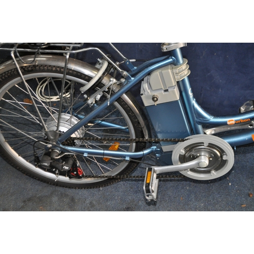 89 - AN URBAN MOVER UM55 CRUISER POWER ASSISTED BICYCLE with battery, charger, key, a Gorin Cylinder ring... 