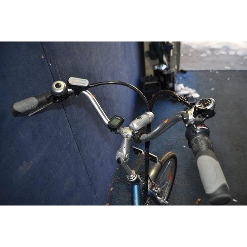 89 - AN URBAN MOVER UM55 CRUISER POWER ASSISTED BICYCLE with battery, charger, key, a Gorin Cylinder ring... 