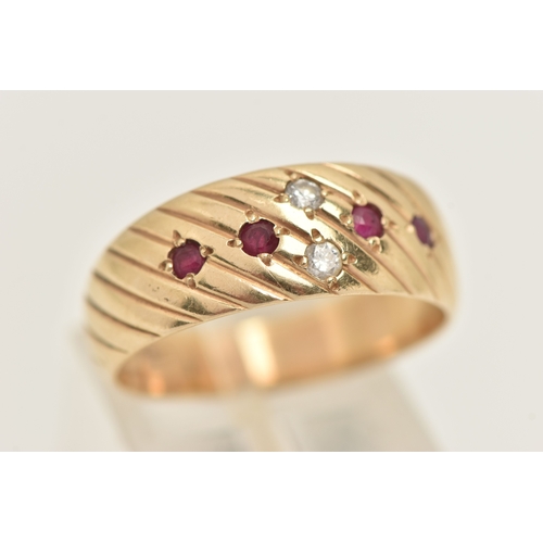 401 - A YELLOW METAL BAND RING, a yellow metal slightly tapered band ring with etched detail, flush set wi... 