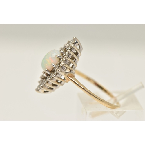 403 - AN OPAL AND DIAMOND CLUSTER RING, a high oval cabochon opal set with a surround of twenty two single... 