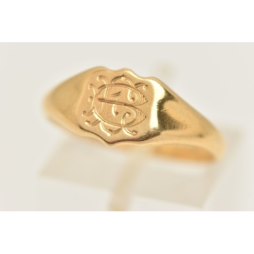 405 - AN 18CT GOLD SIGNET RING, a yellow gold shield form signet ring with monogram engraving, hallmarked ... 