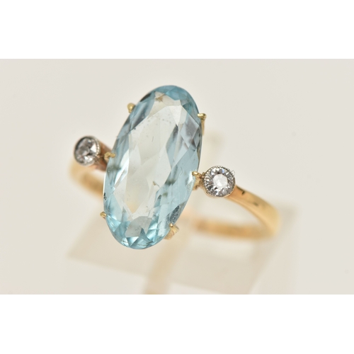 408 - AN 18CT GOLD GEM SET RING, an elongated oval cut aquamarine, approximate total carat weight 3.25ct, ... 