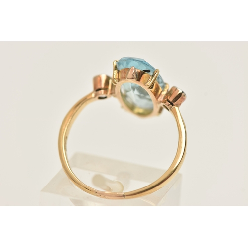 408 - AN 18CT GOLD GEM SET RING, an elongated oval cut aquamarine, approximate total carat weight 3.25ct, ... 