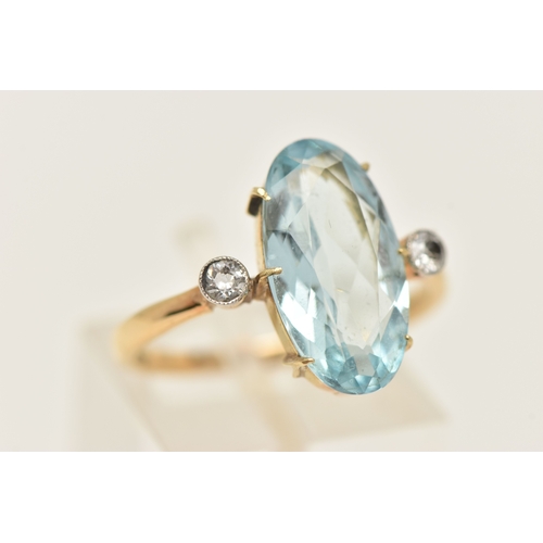 408 - AN 18CT GOLD GEM SET RING, an elongated oval cut aquamarine, approximate total carat weight 3.25ct, ... 