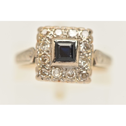409 - AN 18CT GOLD GEM SET RING, a square form design cluster ring, principally set with a square cut sapp... 