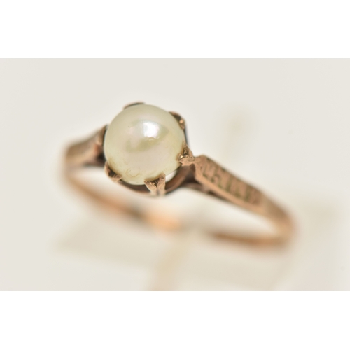 414 - A 9CT GOLD CULTURED PEARL RING, a single cream pearl measuring approximately 6mm, sitting slanted in... 