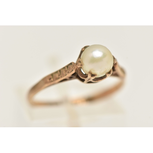 414 - A 9CT GOLD CULTURED PEARL RING, a single cream pearl measuring approximately 6mm, sitting slanted in... 