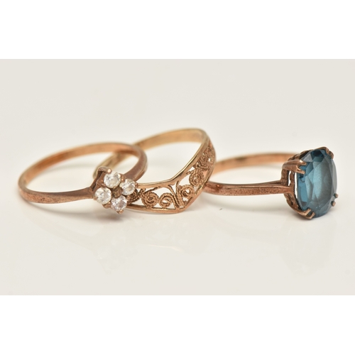 415 - THREE 9CT GOLD RINGS, the first set with a blue topaz, hallmarked 9ct Birmingham, ring size M, the s... 