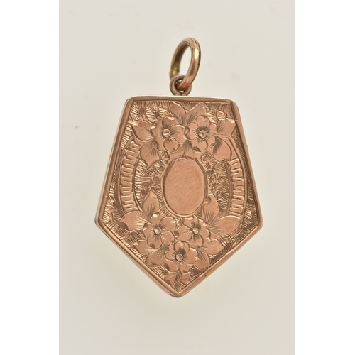 423 - A FANCY SHAPE ROLLED GOLD LOCKET, decorated with a floral and foliate pattern and vacant cartouche, ... 
