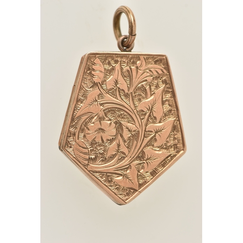 423 - A FANCY SHAPE ROLLED GOLD LOCKET, decorated with a floral and foliate pattern and vacant cartouche, ... 