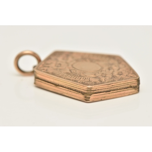 423 - A FANCY SHAPE ROLLED GOLD LOCKET, decorated with a floral and foliate pattern and vacant cartouche, ... 