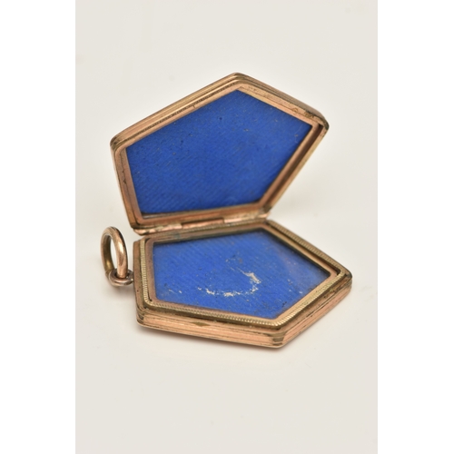 423 - A FANCY SHAPE ROLLED GOLD LOCKET, decorated with a floral and foliate pattern and vacant cartouche, ... 