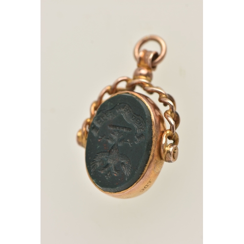 424 - A YELLOW METAL SWIVEL FOB, of an oval form set with an intaglio bloodstone inlay and polished bloods... 