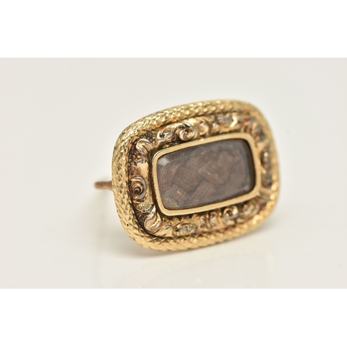 427 - A YELLOW METAL HAIR WORK MEMORIAL BROOCH, of a rounded rectangular form with a central brown woven h... 