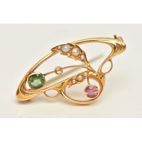 428 - A CASED YELLOW METAL GEM SET BROOCH, of an open work design, set with a pink and a green tourmaline ... 