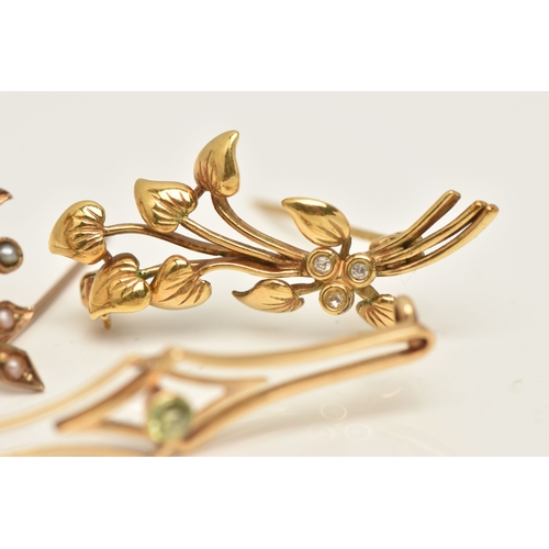 436 - THREE LATE 19TH TO EARLY 20TH CENTURY BROOCHES, the first a yellow metal split pearl set foliate bro... 