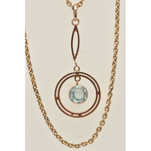 438 - A ROSE METAL GEM SET PENDANT NECKLACE, the pendant of an open work circular form set with a light bl... 