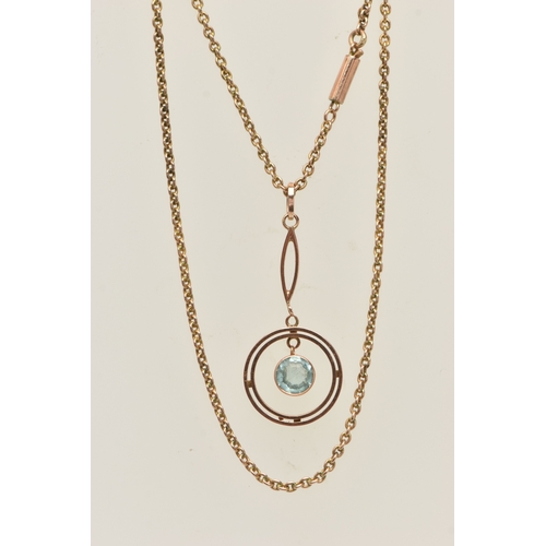 438 - A ROSE METAL GEM SET PENDANT NECKLACE, the pendant of an open work circular form set with a light bl... 