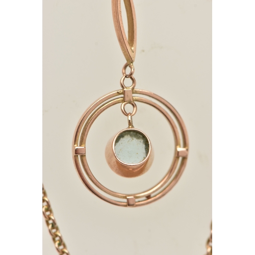 438 - A ROSE METAL GEM SET PENDANT NECKLACE, the pendant of an open work circular form set with a light bl... 